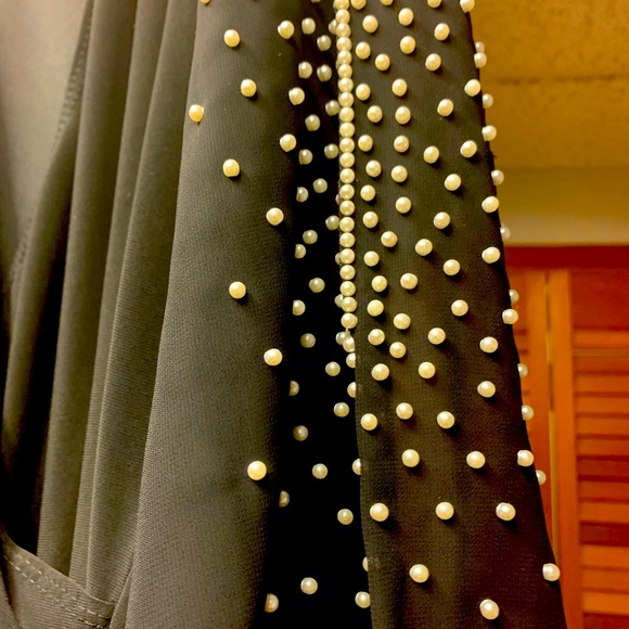 Woman’s black Dress with sheer bell sleeves with pearl accents - Picture 6 of 10